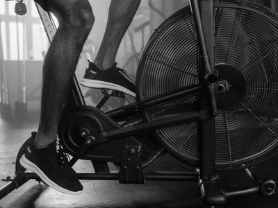 Blurry motion of legs during a cardio exercise session.