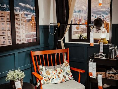 Minimalist interior of a home exercise space with plants.